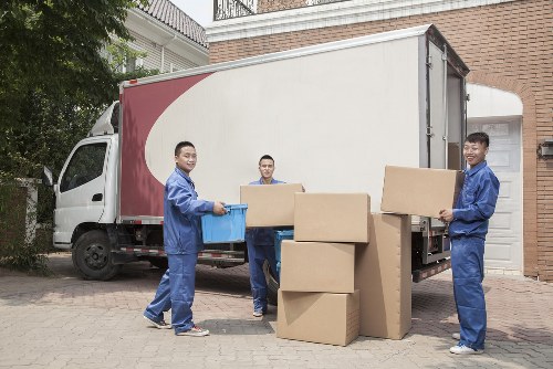Professional movers handling household items during a Pimlico move