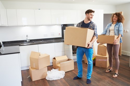Packed office equipment prepared for commercial moves in Pimlico