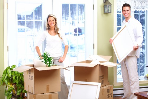 Professional office removals team handling furniture