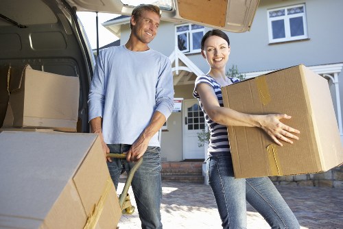 Local moving team organizing belongings for transport