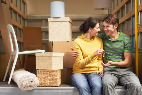 Unpacking and organizing boxes in a Pimlico property after relocation